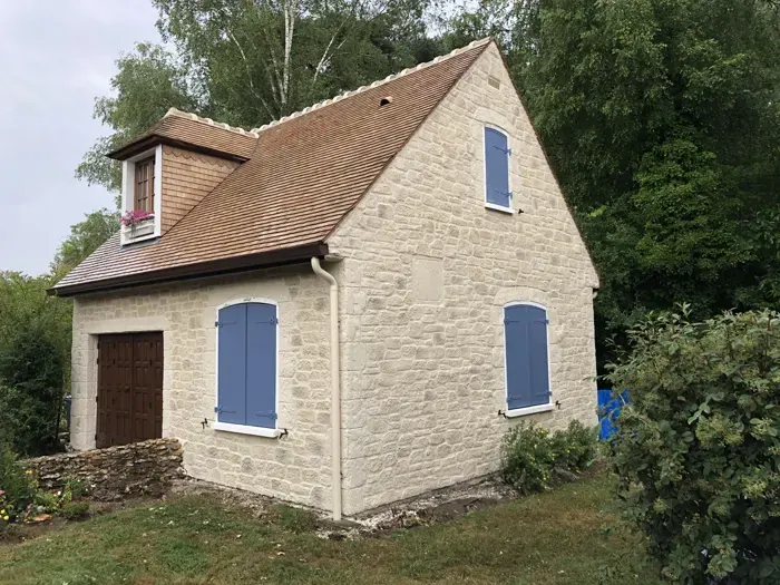 Maison avec lucarne après rénovation